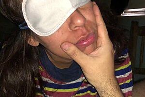 She sucks dick with blindfolded eyes.