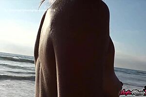 sofie marie teases with her natural tits on the beach, so irresistible