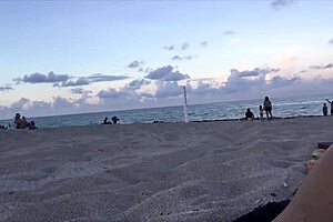 i'm jillian at the beach in tiny gold bikini