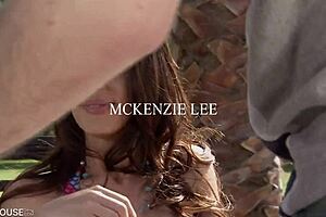 Brunette milf mckenzie lee deepthroats a massive cock by the pool, then gets fucked hard