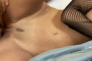 Milf in fishnet body cleans up after a fun time