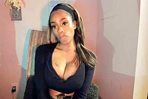 Tattooed milf with big tits teases her pussy in a steamy solo session