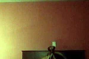 Bare breasted milf with small tits fucks black cock in an amateur video