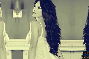 Two gorgeous brunettes intensely striptease and pose seductively