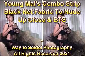 Mai Maos erotic strip, up close tease?