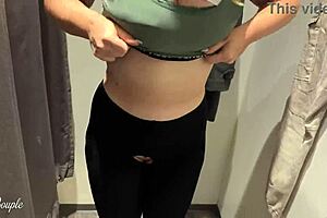 blonde girl gets dirty in public clothing store