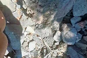 Teresa Jones begins her amateur porn video outdoors