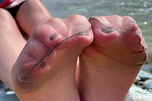 Goddess in Tan Nylons Flaunts Cute Soles by Riverside