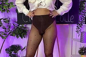 Sexy mature blonde dons see-through tights at club