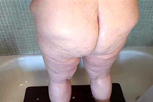 Big natural tits and bubble butt in a shower scene