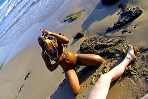 Black milf gets pounded hard on a sunny beach day