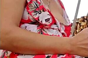 This hot blonde milf is masturbating to orgasm, showing off her natural tits in a steamy session.