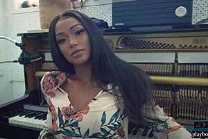 harley dean, ebony model, poses in studio for playboy