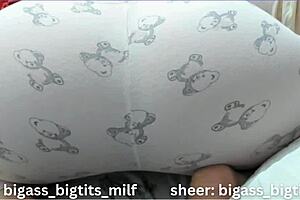 A mature woman in a nightie masturbates with her big pussy and ass