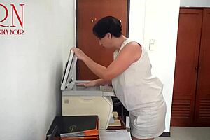 dumb secretary caught on office cam scanning boobs at scanner