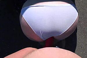 So, this girlfriend strapped on and banged a curvy milf by the car. Wild outdoor lesbian action!