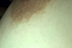 Milf Slut Spilling Milk from Her Balloon Tits in Wild Scene