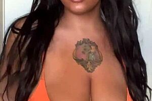 Horny milf slut dances intensely in bikini.