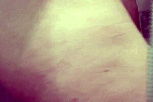 The treasonous wife, a slutty blonde MILF, gets fucked doggy style by the neighbor in the shower, ending with a close-up creampie cumshot