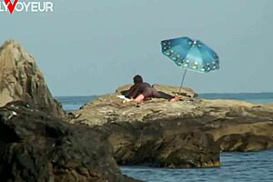 Public beach voyeur gets lucky with tan lines babe