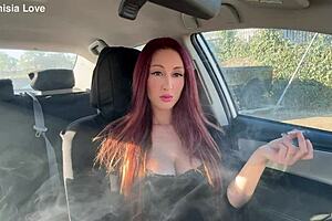Italian Milf Artemisia Love Enjoys Smoking in the Car with Long Hair and Big Tits