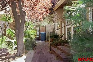 Peeping the next door MILF's big cock action!