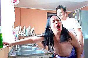 Fucking my stepmom in the kitchen with no shirt on