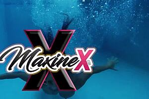 Maxine and Nyssa Nevers share a doggy style moment during their intense lesbian clip