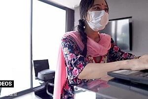 A desi wife and her husband share intimate moments with a student in their home