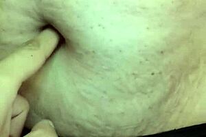 exploring a milf's belly during a relaxing massage session.