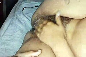 Bhabhi is licking her own pussy with the help of fingers and tongue