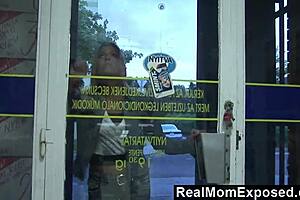 In this exposed scene, the blonde milf pays the cashier with a blowjob on his cock