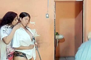 Lesbians have sex in front of painter.