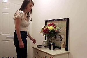A college girl is getting punished with a spanking