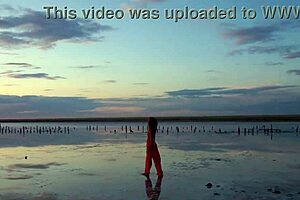Walking on red sunset in Elton Salt Lake, a breathtaking sight