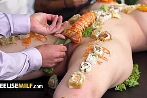 The chef, a busty Japanese woman, combines sex and cooking