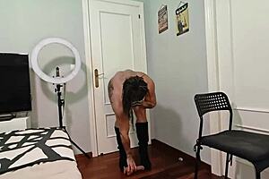 dominatrix danaxmuscles, a tattooed muscular mature bodybuilder, orders them to cum in her boots