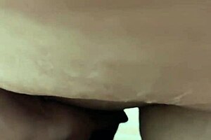 my brunette stepsister celebrates halloween in a hotel bed, shaking her body sexily before getting naked