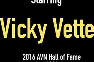 Vicky Vette in lace teases her big clit while rubbing pussy on bed