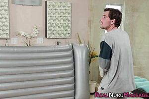 Blonde milf with huge breasts jerks cock in intense massage session