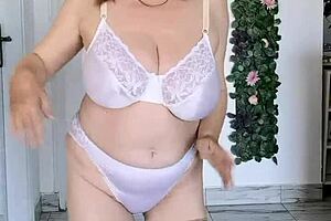 Busty Granny Shakes Big Tits in Sexy Lingerie Dance!