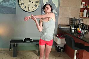 desperate woman in tight pants pisses during yoga stretches