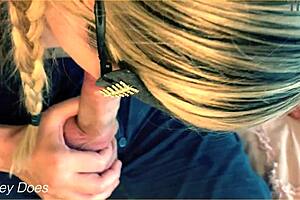 Wife gives an amazing blowjob to her husband's long cock, showcasing her shaved pussy.