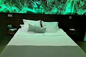 Latina milf seduces chubby hotel handyman. He oils her up until she squirts everywhere!