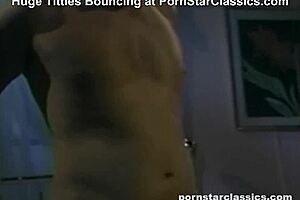 the night temptress licks and plays with big tits