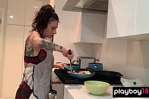 Inked milf housewife Joanna Angel is cooking in the kitchen and dildoing her hungry pussy 😏