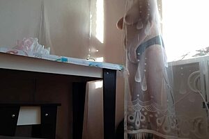 I caught my stepmom hiding and masturbating behind the curtain, leading to a big orgasm