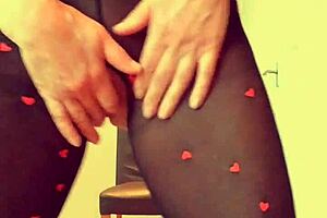 Stunning British milf Lilithalgol in bodystocking and heels plays with insertion for a standing climax.