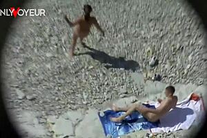 Busty cougar rides hard dick on beach, gets facial.