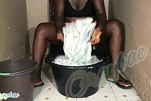 Housewife Does Weekend Laundry in Shaved Pussy